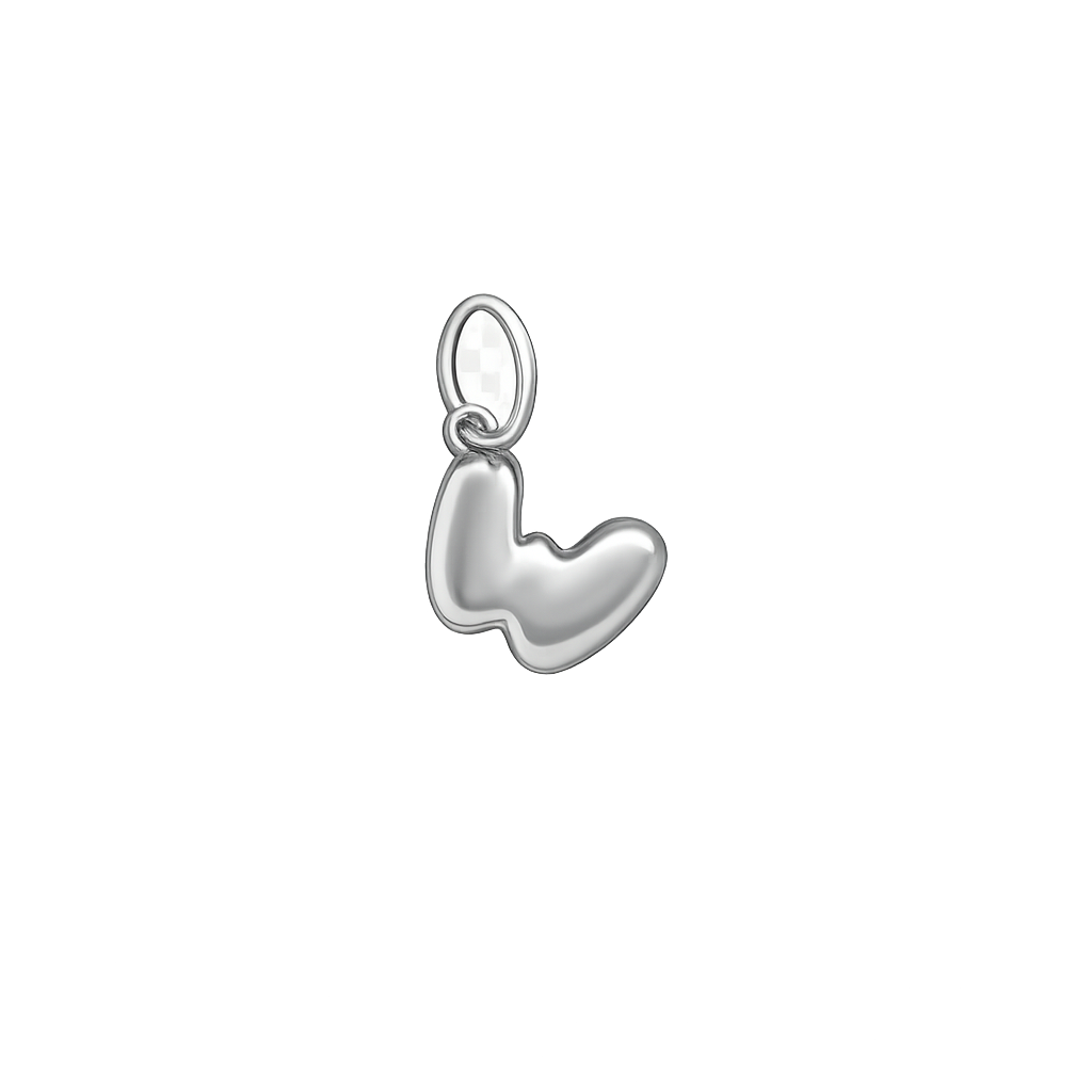 Silver shoe charm on a white background