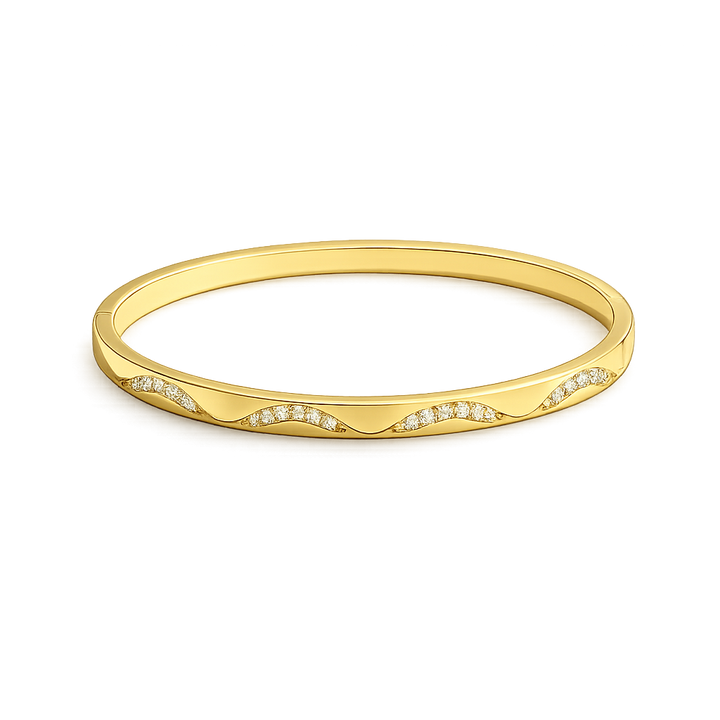 Gold bracelet with small diamonds on a white background