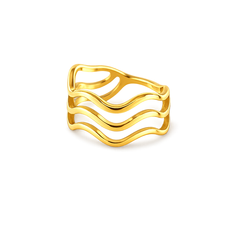 Gold ring with wavy design on a white background